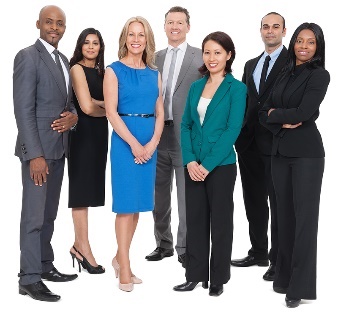 A group of people in office clothes.