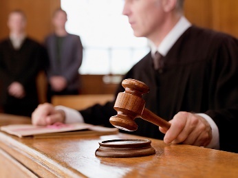 A judge holding a gavel.