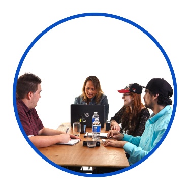 A group of people sharing ideas at a table.