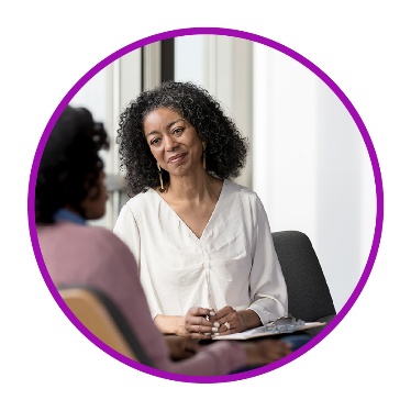 A researcher listening to someone else.
