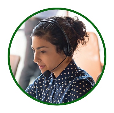 A person speaking into a headset.