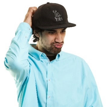 A person looking worried, scratching their head. 