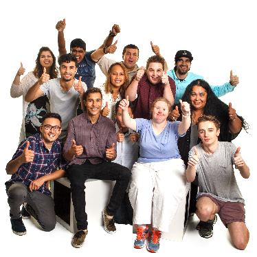 A group of people with their hands raised. 