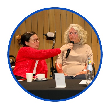 2 people at a workshop.