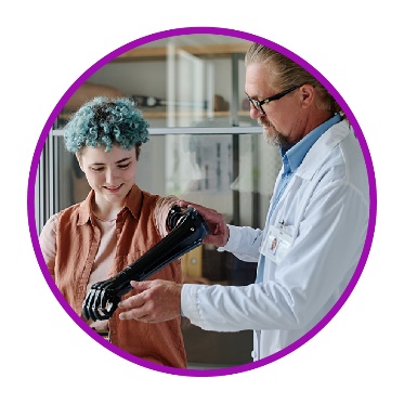 A doctor supporting a person with disability.