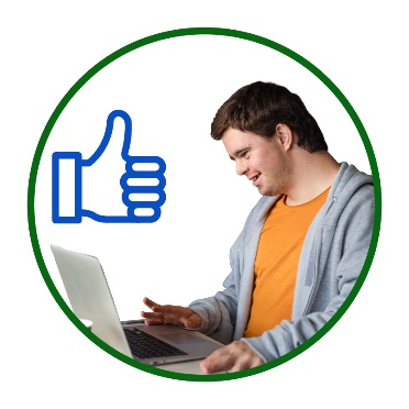 A person using a laptop next to a thumbs up.
