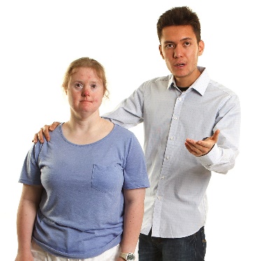 A person with their hand on someone else's shoulder. 