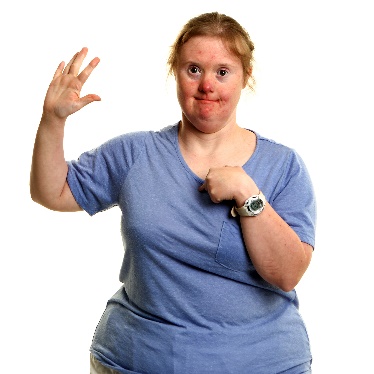 A person pointing at themselves with their hand raised. 