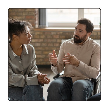 2 people talking. 