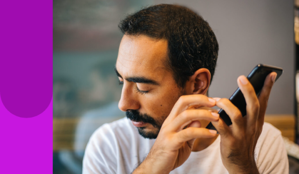 Man listening intently to phone